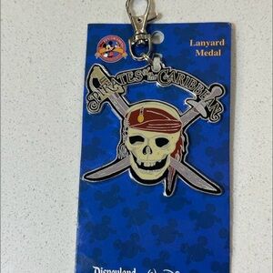 Disney Pin Trading Pirates of the Caribbean Skull Lanyard Medal New